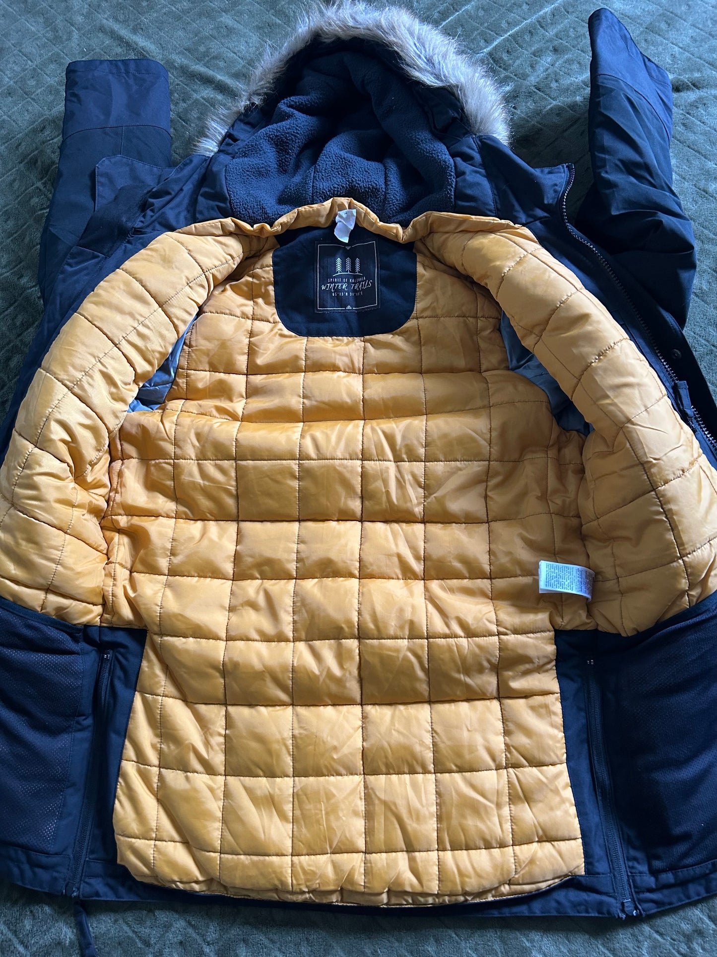 Parka quechua grand froid d’occasion pour hommes. Taille S