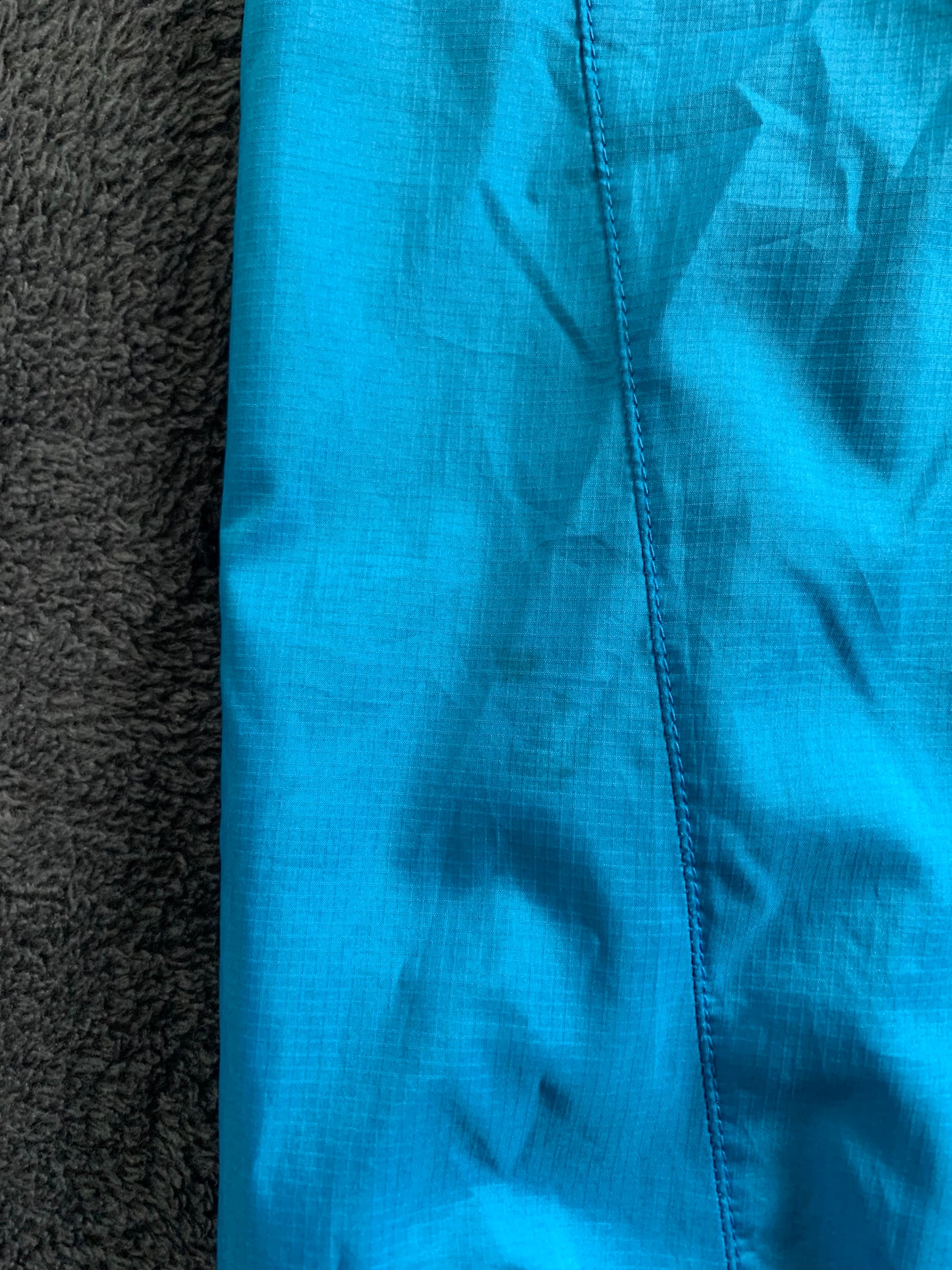 Veste coupe vent Norrona d’occasion pour hommes. Taille S.
