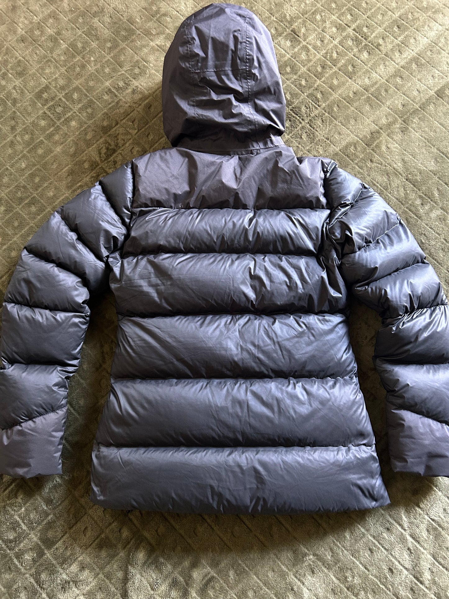 Doudoune forclaz MT900 d’occasion en plumes pour femmes. Taille XS