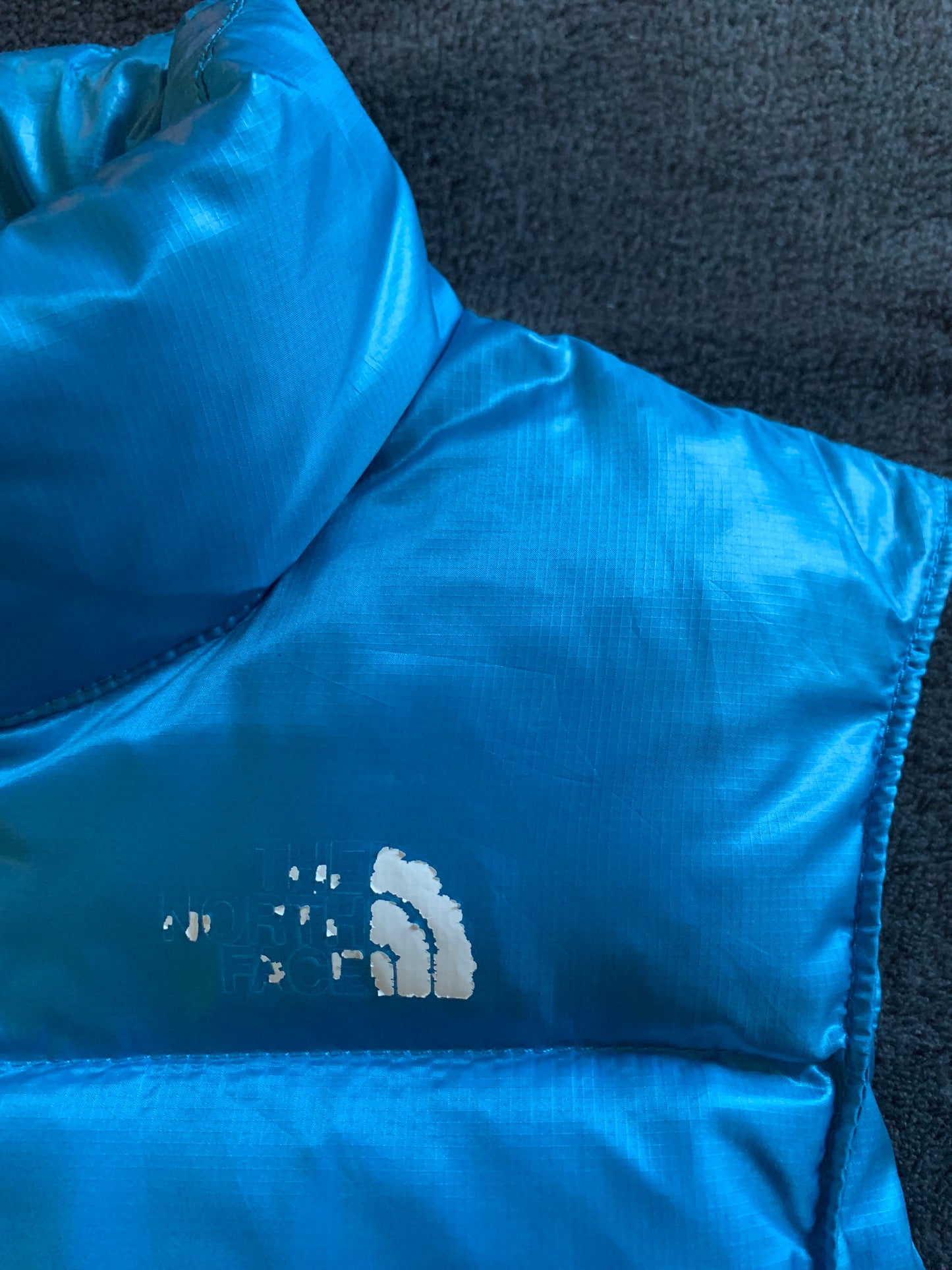 Doudoune sans manches the north face d’occasion pour femmes. Taille XS.