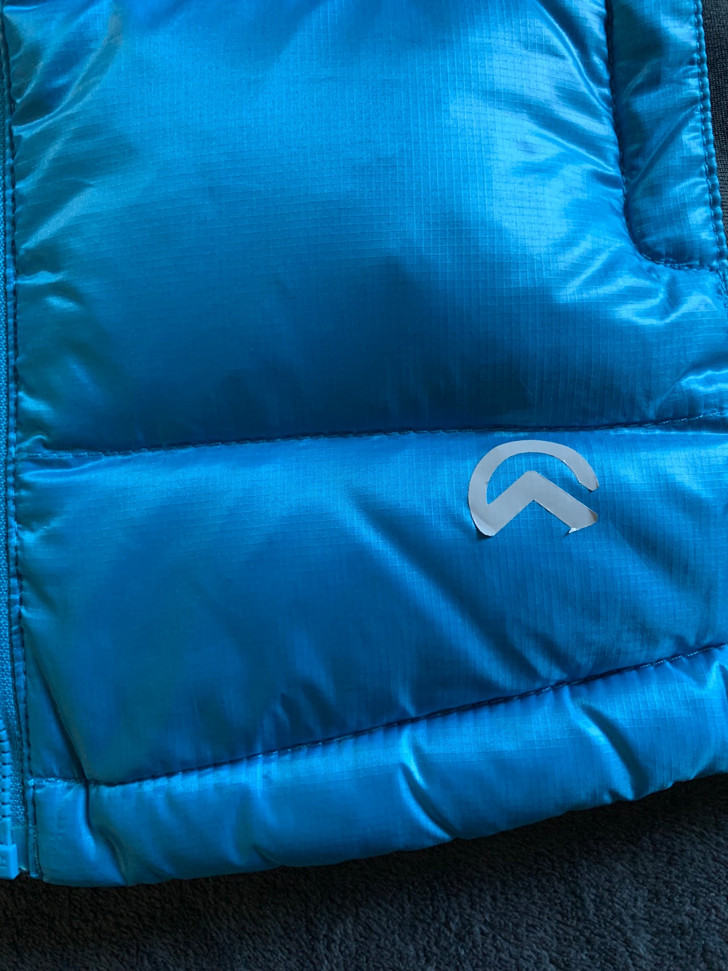 Doudoune sans manches the north face d’occasion pour femmes. Taille XS.