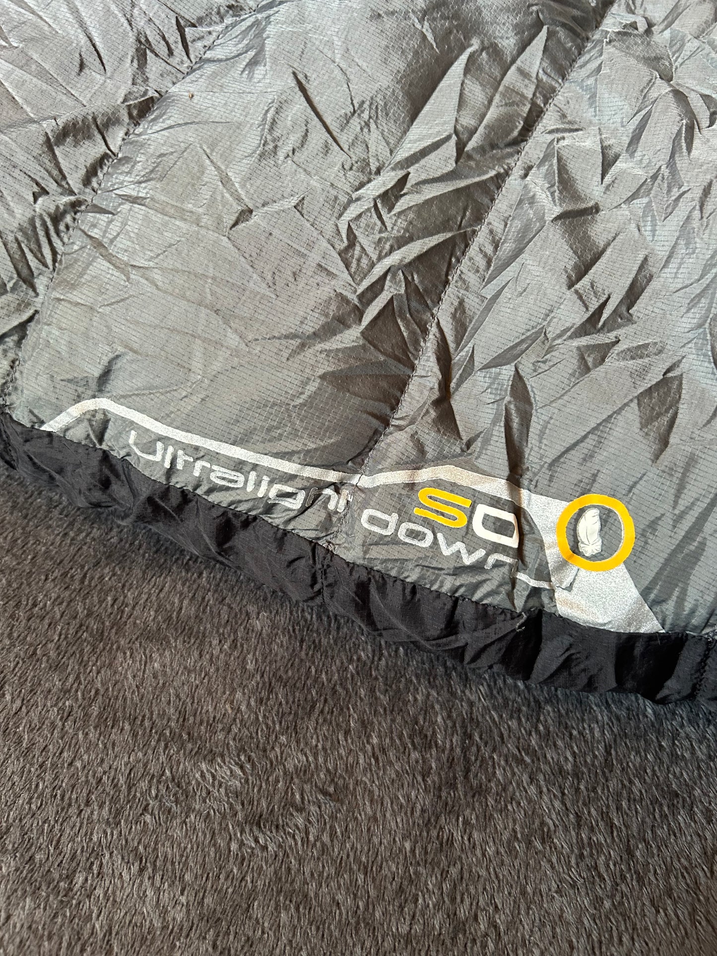Sac de couchage quechua d’occasion en plumes 0 degrés. Taille M.