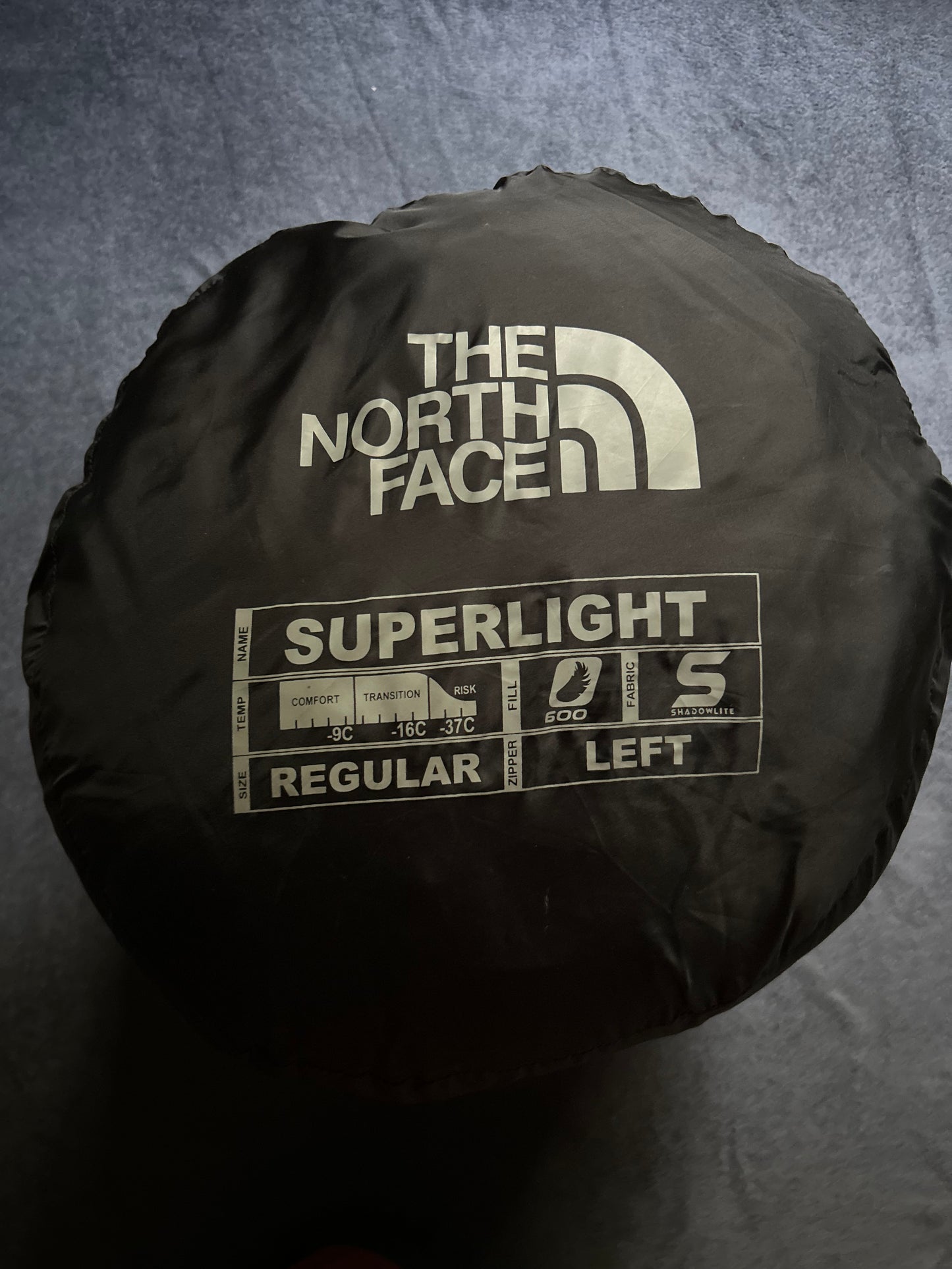 Sac de couchage the North face en plumes d’occasion. Taille M