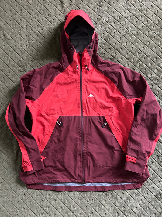 Veste imperméable quechua MH500 d’occasion pour femme. Taille 2XL.